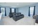 Home theater with two reclining chairs and large screen at 5283 Bracks Landing Dr Dr, St Cloud, FL 34771