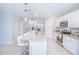 Modern kitchen with granite countertops and white cabinets at 5283 Bracks Landing Dr Dr, St Cloud, FL 34771