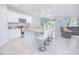 Modern kitchen with granite countertops and white cabinets at 5283 Bracks Landing Dr Dr, St Cloud, FL 34771
