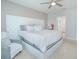 Main bedroom with king-size bed and en-suite bathroom access at 5283 Bracks Landing Dr Dr, St Cloud, FL 34771