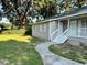 House exterior, walkway, and grassy yard at 5920 Nw 65Th St, Ocala, FL 34482