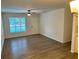 Bright living room with wood-look floors at 5920 Nw 65Th St, Ocala, FL 34482