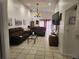 Open living area with tile flooring, natural light, and comfortable seating, great for entertaining at 602 Caddy Dr, Kissimmee, FL 34759
