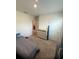 Small bedroom with a twin bed and dresser at 606 Tortugas St, Haines City, FL 33844
