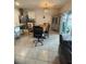 Kitchen and dining area with table and chairs at 606 Tortugas St, Haines City, FL 33844