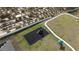 Aerial view of a playground with swings and slides at 606 Tortugas St, Haines City, FL 33844