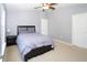 Cozy bedroom with a double bed and built-in dresser at 7122 Forty Banks Rd # 39A, Harmony, FL 34773