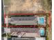 Aerial view of a backyard featuring pool with hot tub surrounded by sun loungers and palm trees at 733 Desert Mountain Ct, Reunion, FL 34747