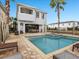 Home featuring a private pool and patio area, perfect for outdoor entertaining at 733 Desert Mountain Ct, Reunion, FL 34747