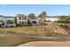 Backyards overlook the golf course with pools and landscaping at 733 Desert Mountain Ct, Reunion, FL 34747