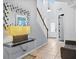 Bright and airy entryway with a staircase and stylish decor at 733 Desert Mountain Ct, Reunion, FL 34747