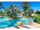 Float along in this lazy river surrounded by tropical trees and rock features, perfect for a tranquil day at 733 Desert Mountain Ct, Reunion, FL 34747