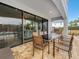 Enjoy outdoor dining on the covered patio with ample seating and views of the pool at 733 Desert Mountain Ct, Reunion, FL 34747