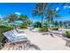 Relax by the pool with lots of lounge chairs to bask in the sunshine in this tropical paradise at 733 Desert Mountain Ct, Reunion, FL 34747