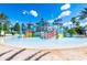 can enjoy this splash pad with a water jungle gym and shallow wading pool for a fun time at 733 Desert Mountain Ct, Reunion, FL 34747