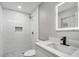 Modern bathroom with a walk-in shower and a vanity at 8607 Tarragon Dr, Orlando, FL 32825
