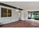 Spacious screened porch with tile flooring, perfect for relaxing at 8607 Tarragon Dr, Orlando, FL 32825