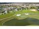 Community overview, including golf course and pond at 8879 Cabot Cliffs Dr # 103, Davenport, FL 33896