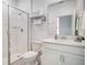 Clean bathroom with shower, toilet and vanity at 8879 Cabot Cliffs Dr # 103, Davenport, FL 33896