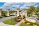 Ornate entrance to the ChampionsGate community at 8879 Cabot Cliffs Dr # 103, Davenport, FL 33896