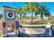 ChampionsGate community entrance with festive holiday decor at 8879 Cabot Cliffs Dr # 103, Davenport, FL 33896
