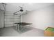 Finished garage with ping pong table at 8879 Cabot Cliffs Dr # 103, Davenport, FL 33896