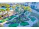 Landscaped mini golf course with winding paths at 8879 Cabot Cliffs Dr # 103, Davenport, FL 33896