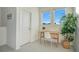 Small home office with a desk, chair, and plant at 8879 Cabot Cliffs Dr # 103, Davenport, FL 33896