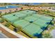 Aerial view of community tennis courts at 8879 Cabot Cliffs Dr # 103, Davenport, FL 33896