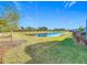 Peaceful backyard with pond view and lush grass at 1062 Umbria Dr, Kissimmee, FL 34759