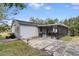 Spacious backyard with patio and screened porch at 110 Talavera Ln, Kissimmee, FL 34758