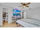 Bedroom with large TV and walk-in closet at 110 Talavera Ln, Kissimmee, FL 34758