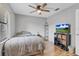 Bedroom with a bed and wood floors at 110 Talavera Ln, Kissimmee, FL 34758