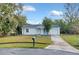 Single-story home with attached garage and lawn at 110 Talavera Ln, Kissimmee, FL 34758