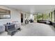 Cozy screened porch with patio furniture and storage at 110 Talavera Ln, Kissimmee, FL 34758