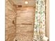 Bathroom with walk-in shower, stone tile, and updated fixtures at 12414 Baleria Cv # 108, Orlando, FL 32837