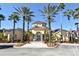Elegant community clubhouse with welcoming entryway and landscaping at 12414 Baleria Cv # 108, Orlando, FL 32837