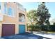 Exterior view showing building with attached garages at 12414 Baleria Cv # 108, Orlando, FL 32837