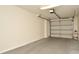 Clean and functional garage with automatic garage door opener at 12414 Baleria Cv # 108, Orlando, FL 32837