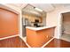 Kitchen boasts stainless steel appliances and breakfast bar at 12414 Baleria Cv # 108, Orlando, FL 32837