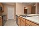Kitchen features stainless steel appliances and light wood cabinets at 12414 Baleria Cv # 108, Orlando, FL 32837