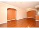 Bright living room with hardwood floors and access to balcony at 12414 Baleria Cv # 108, Orlando, FL 32837