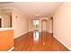 Spacious living room with hardwood floors and access to balcony at 12414 Baleria Cv # 108, Orlando, FL 32837