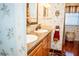 Double vanity bathroom with granite countertops at 1296 Skyline Dr, Tavares, FL 32778