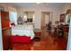 Spacious bedroom with king-size bed and mirrored closet doors at 1296 Skyline Dr, Tavares, FL 32778