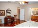 Bright bedroom with a vanity and access to bathroom at 1296 Skyline Dr, Tavares, FL 32778