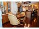 Bright kitchen nook with round table and four chairs at 1296 Skyline Dr, Tavares, FL 32778