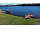 Private dock and stunning lake view from the property at 1296 Skyline Dr, Tavares, FL 32778
