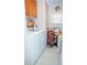 Laundry room with washer, dryer, and sewing space at 1296 Skyline Dr, Tavares, FL 32778
