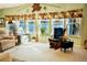 Relaxing living room with lake views and comfortable seating at 1296 Skyline Dr, Tavares, FL 32778